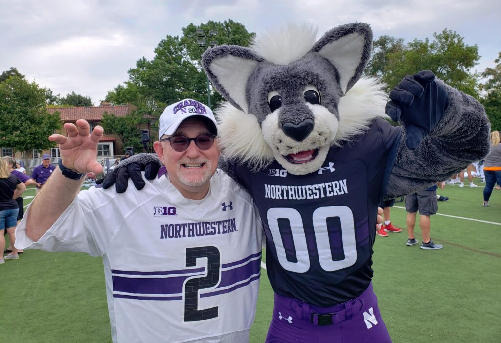 Stephen Rothschild with Northwestern wolf mascot